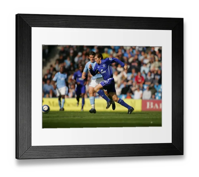 Framed Print : Kevin Kilbane: Outpacing Manchester City's Defense with Lightning Speed Framed Print : Kevin Kilbane: Outpacing Manchester City's Defense with Lightning Speed