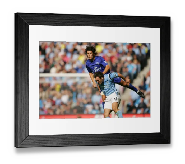 Framed Print : Soaring High: Nuno Valente's Victory-Seeking Header for Everton Framed Print : Soaring High: Nuno Valente's Victory-Seeking Header for Everton