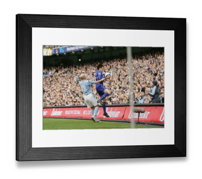 Framed Print : Kevin Kilbane vs. Danny Mills: A Football Battle - Kilbane Outmaneuvered by Mills Framed Print : Kevin Kilbane vs. Danny Mills: A Football Battle - Kilbane Outmaneuvered by Mills
