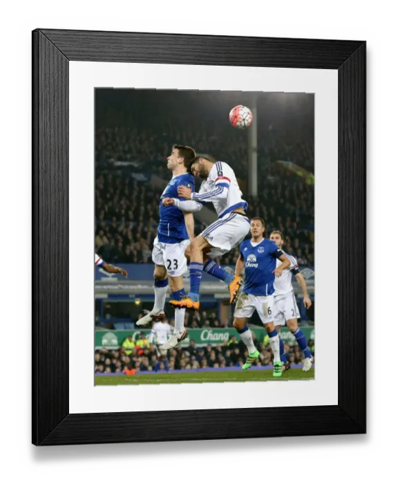 Framed Print : Seamus Coleman vs Diego Costa: Aerial Battle in the Emirates FA Cup Quarterfinal at Goodison Park (Everton vs Chelsea) Framed Print : Seamus Coleman vs Diego Costa: Aerial Battle in the Emirates FA Cup Quarterfinal at Goodison Park (Everton vs Chelsea)
