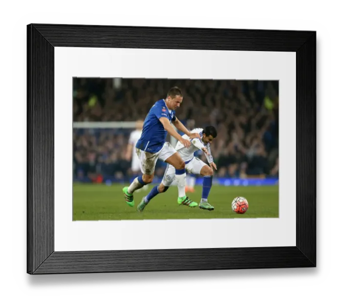 Framed Print : Jagielka vs Pedro: FA Cup Quarter-Final Battle at Goodison Park Framed Print : Jagielka vs Pedro: FA Cup Quarter-Final Battle at Goodison Park
