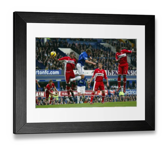 Framed Print : James Beattie Scores Past Ugo Ehiogu for Everton Framed Print : James Beattie Scores Past Ugo Ehiogu for Everton