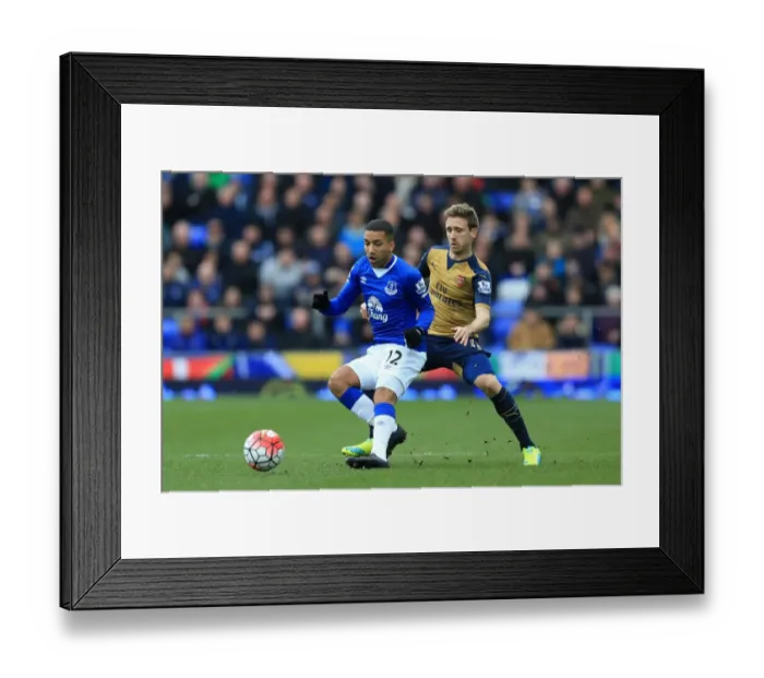 Framed Print : Intense Rivalry: Lennon vs Monreal at Goodison Park - Everton vs Arsenal, Premier League: A Battle for the Ball Framed Print : Intense Rivalry: Lennon vs Monreal at Goodison Park - Everton vs Arsenal, Premier League: A Battle for the Ball