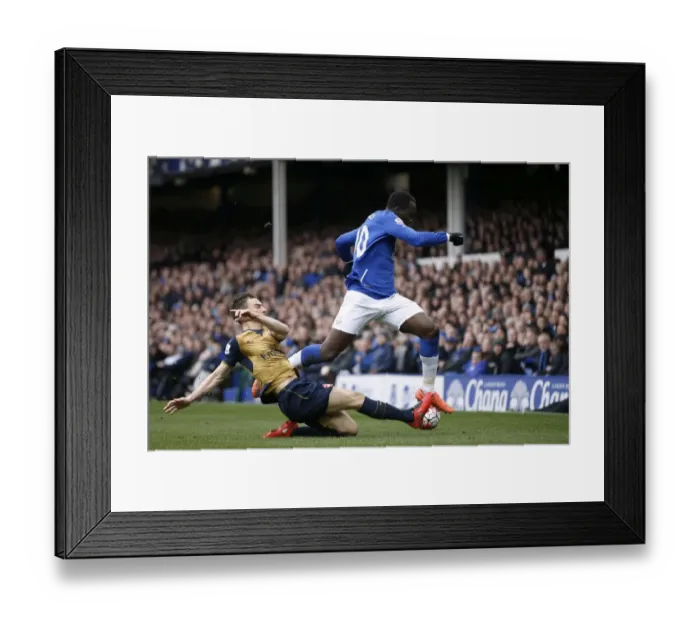 Framed Print : Everton vs Arsenal: Intense Battle Between Lukaku and Koscielny at Goodison Park Framed Print : Everton vs Arsenal: Intense Battle Between Lukaku and Koscielny at Goodison Park