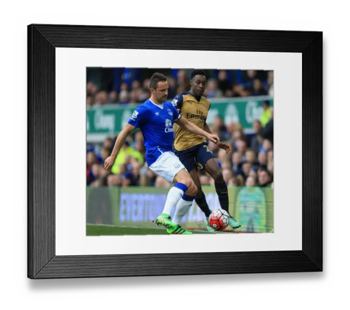 Framed Print : Everton vs Arsenal: Jagielka vs Welbeck - A Battle for the Ball in the Barclays Premier League at Goodison Park Framed Print : Everton vs Arsenal: Jagielka vs Welbeck - A Battle for the Ball in the Barclays Premier League at Goodison Park
