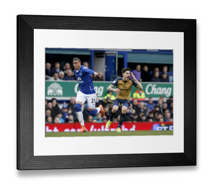Framed Print : Clash at Goodison Park: Everton's Funes Mori vs. Arsenal's Bellerin Framed Print : Clash at Goodison Park: Everton's Funes Mori vs. Arsenal's Bellerin