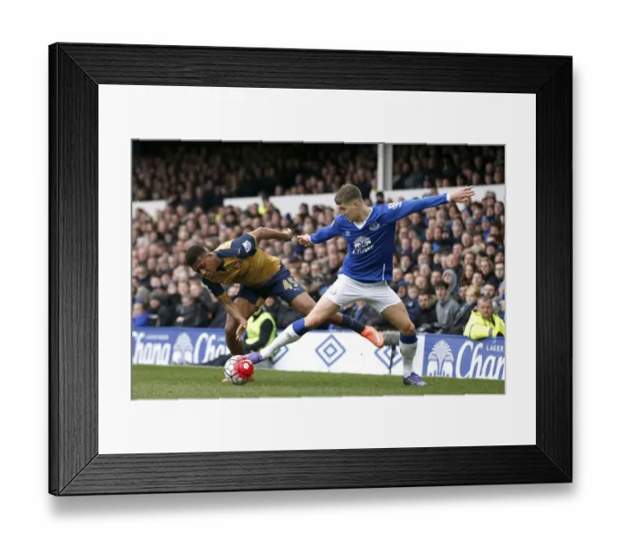 Framed Print : Clash at Goodison Park: Stones vs. Iwobi in Premier League Showdown Framed Print : Clash at Goodison Park: Stones vs. Iwobi in Premier League Showdown