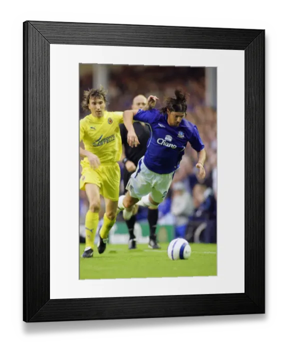 Framed Print : Alessandro Pistone: Down but Not Out in Everton's Champions League Battle Framed Print : Alessandro Pistone: Down but Not Out in Everton's Champions League Battle