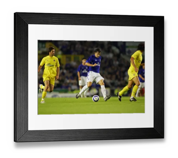 Framed Print : Everton's Simon Davies Goes Head-to-Head: Everton FC vs Villarreal - The Intense Midfield Battle Framed Print : Everton's Simon Davies Goes Head-to-Head: Everton FC vs Villarreal - The Intense Midfield Battle
