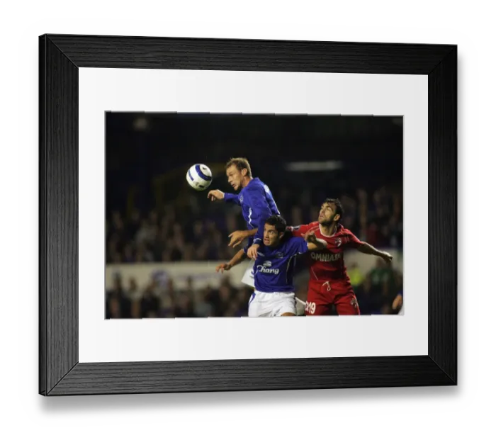 Framed Print : Duncan Ferguson: Soaring High with Everton Football Club