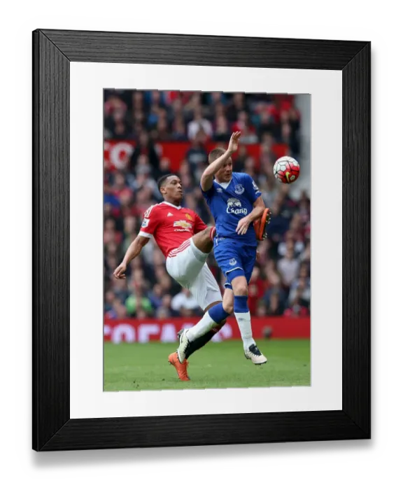 Framed Print : Intense Rivalry: Martial vs. McCarthy - Manchester United vs. Everton: A Battle for Supremacy Framed Print : Intense Rivalry: Martial vs. McCarthy - Manchester United vs. Everton: A Battle for Supremacy