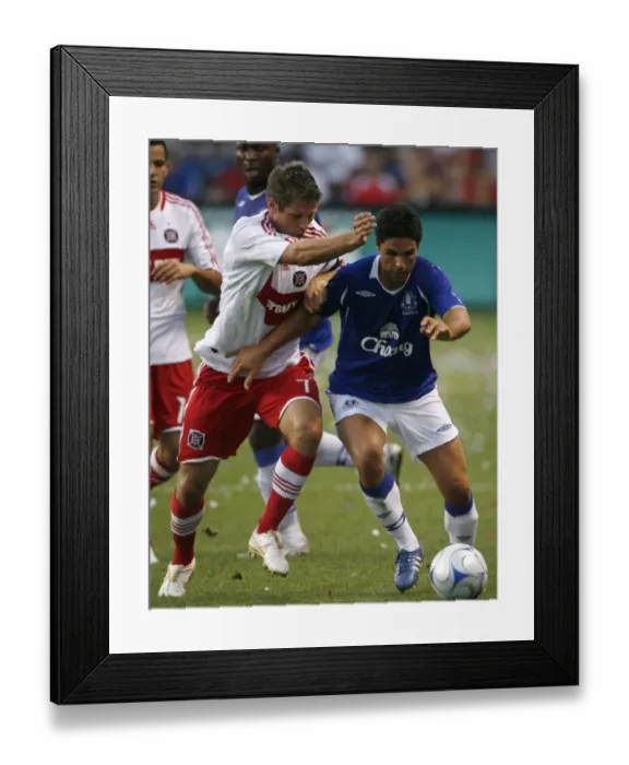 Framed Print : Mikel Arteta vs. Logan Pause: A Fight for Supremacy in Everton's Friendly Clash against Chicago Fire Framed Print : Mikel Arteta vs. Logan Pause: A Fight for Supremacy in Everton's Friendly Clash against Chicago Fire