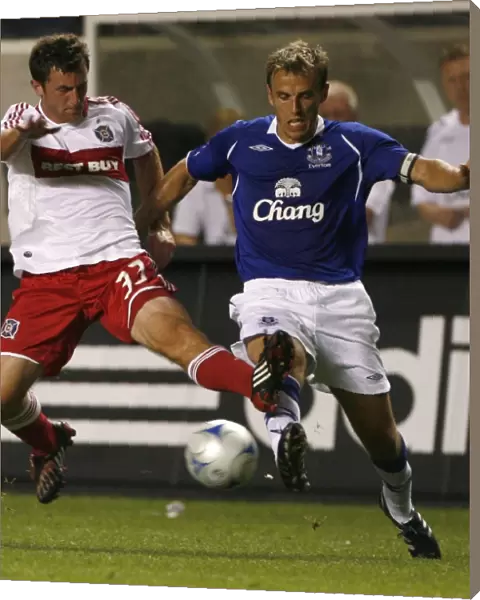 Everton FC Phil Neville struggles with Chicago Fire Stephen King In Bridgeview I
