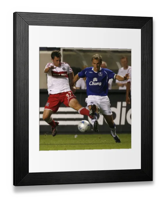 Framed Print : Everton FC Phil Neville struggles with Chicago Fire Stephen King In Bridgeview I Framed Print : Everton FC Phil Neville struggles with Chicago Fire Stephen King In Bridgeview I