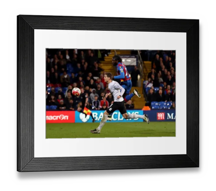 Framed Print : Battle for the Ball: Adebayor vs. Stones in Crystal Palace vs. Everton Premier League Clash Framed Print : Battle for the Ball: Adebayor vs. Stones in Crystal Palace vs. Everton Premier League Clash
