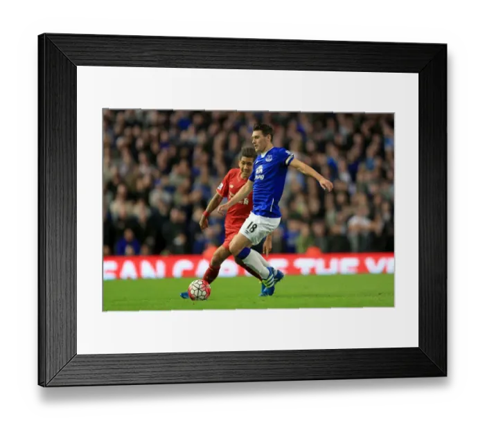 Framed Print : Intense Rivalry: Firmino vs. Barry - Liverpool vs. Everton at Anfield: A Battle for the Ball Framed Print : Intense Rivalry: Firmino vs. Barry - Liverpool vs. Everton at Anfield: A Battle for the Ball