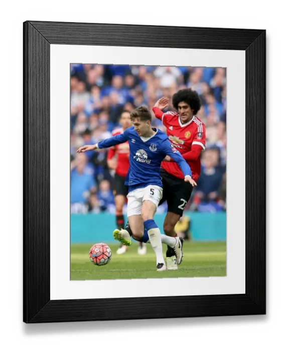 Framed Print : Everton vs Manchester United: A Battle for the FA Cup Semi-Final Ball - Fellaini vs Stones at Wembley Stadium