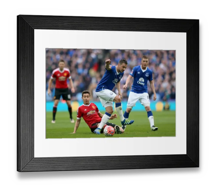 Framed Print : Jagielka vs Herrera: An Intense Battle for FA Cup Supremacy - Everton vs Manchester United at Wembley Stadium Framed Print : Jagielka vs Herrera: An Intense Battle for FA Cup Supremacy - Everton vs Manchester United at Wembley Stadium