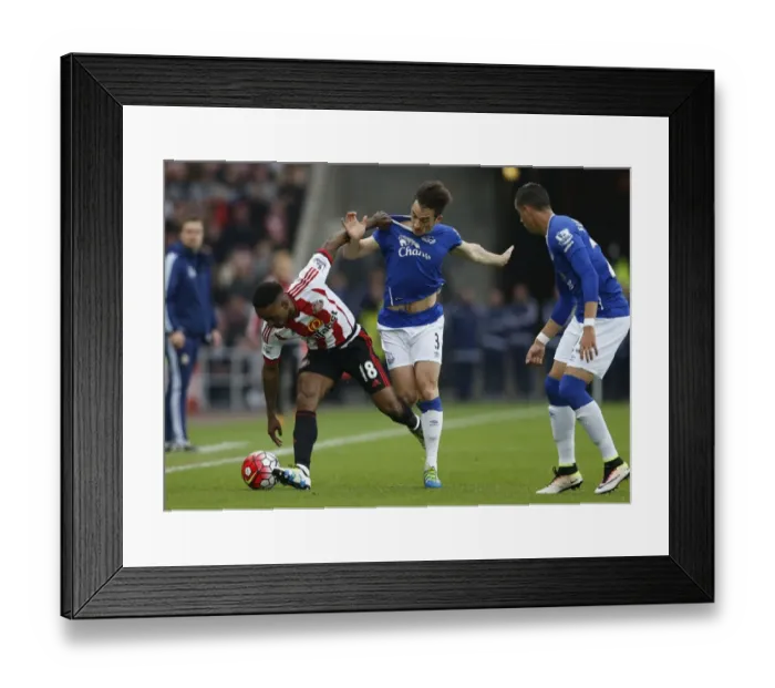 Framed Print : Intense Rivalry: Baines vs Defoe Battle for Ball - Sunderland vs Everton, Premier League Framed Print : Intense Rivalry: Baines vs Defoe Battle for Ball - Sunderland vs Everton, Premier League