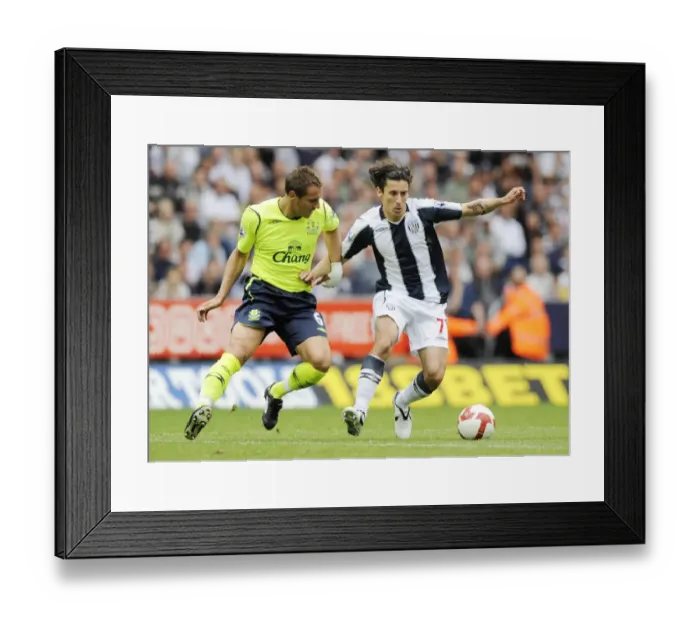 Framed Print : Phil Jagielka vs. Robert Koren: Everton vs. West Bromwich Albion in Barclays Premier League, 2008 - Intense Rivalry on The Hawthorns Field