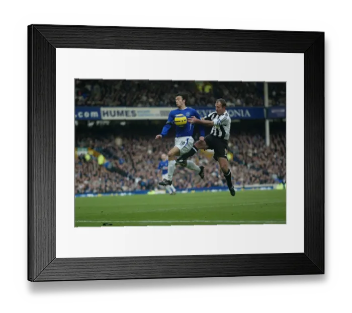 Framed Print : Intense Rivalry: Alan Shearer vs. Simon Davies - A Football Showdown at Everton Framed Print : Intense Rivalry: Alan Shearer vs. Simon Davies - A Football Showdown at Everton