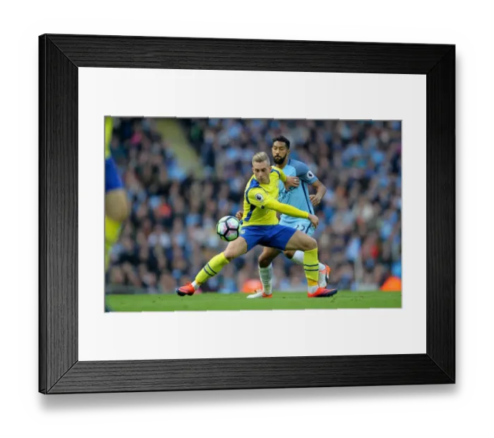 Framed Print : Clash at Etihad: A Battle Between Gael Clichy and Gerard Deulofeu Framed Print : Clash at Etihad: A Battle Between Gael Clichy and Gerard Deulofeu