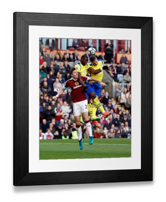 Framed Print : Clash at Turf Moor: Jagielka and Bolasie Battle Ward for Ball Control in Everton vs Burnley Premier League Encounter Framed Print : Clash at Turf Moor: Jagielka and Bolasie Battle Ward for Ball Control in Everton vs Burnley Premier League Encounter
