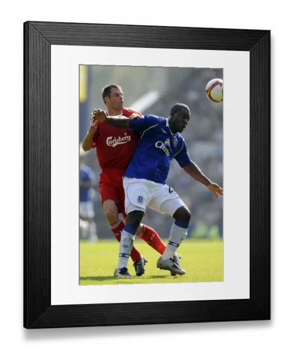 Framed Print : Yakubu vs Carragher: Intense Rivalry in Everton vs Liverpool Premier League Clash, 2008 Framed Print : Yakubu vs Carragher: Intense Rivalry in Everton vs Liverpool Premier League Clash, 2008