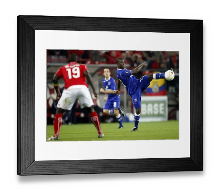 Framed Print : Intense Clash: Yakubu vs. Sarr - Standard Liege vs. Everton UEFA Cup First Round Framed Print : Intense Clash: Yakubu vs. Sarr - Standard Liege vs. Everton UEFA Cup First Round