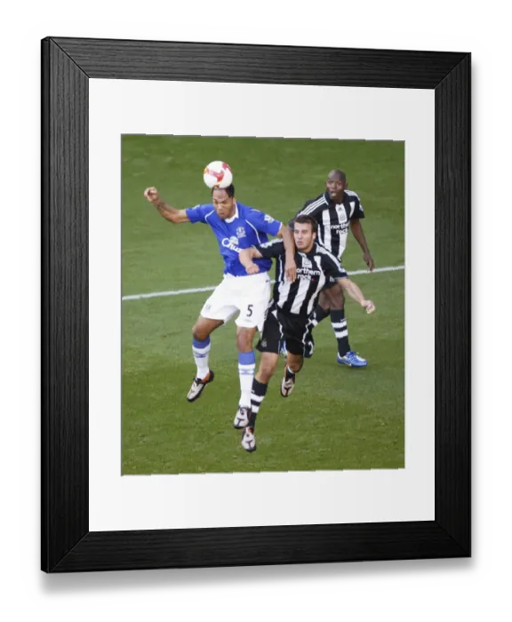 Framed Print : Lescott vs Taylor and Geremi: Everton vs Newcastle United Clash (08 / 09)