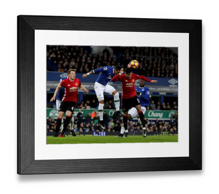 Framed Print : Battle for the Ball: Funes Mori vs Rojo - Everton vs Manchester United Framed Print : Battle for the Ball: Funes Mori vs Rojo - Everton vs Manchester United