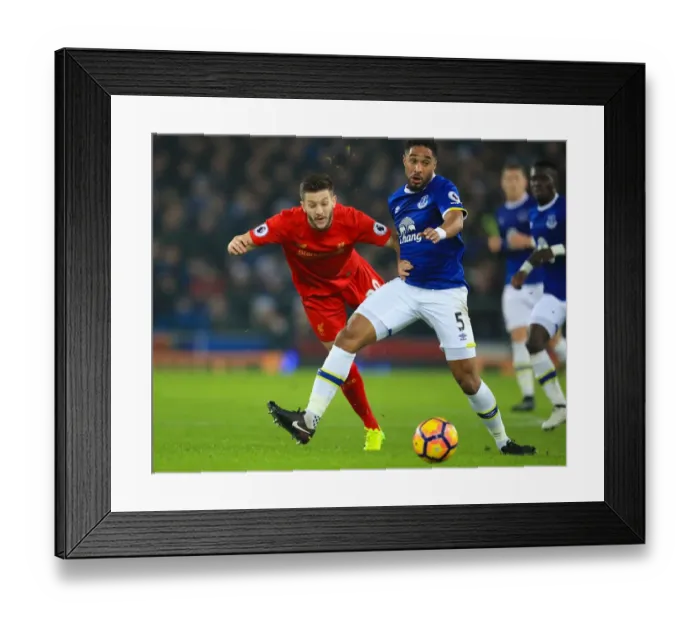 Framed Print : Everton vs Liverpool: A Battle for the Ball - Lallana vs Williams at Goodison Park Framed Print : Everton vs Liverpool: A Battle for the Ball - Lallana vs Williams at Goodison Park