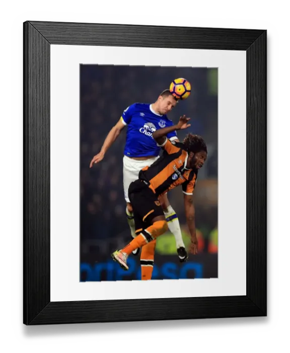 Framed Print : Everton vs Hull City: Jagielka vs Mbokani - Aerial Battle in the Premier League
