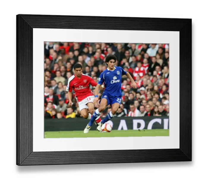 Framed Print : Intense Rivalry: Fellaini vs. Denilson in Arsenal vs. Everton Premier League Clash Framed Print : Intense Rivalry: Fellaini vs. Denilson in Arsenal vs. Everton Premier League Clash