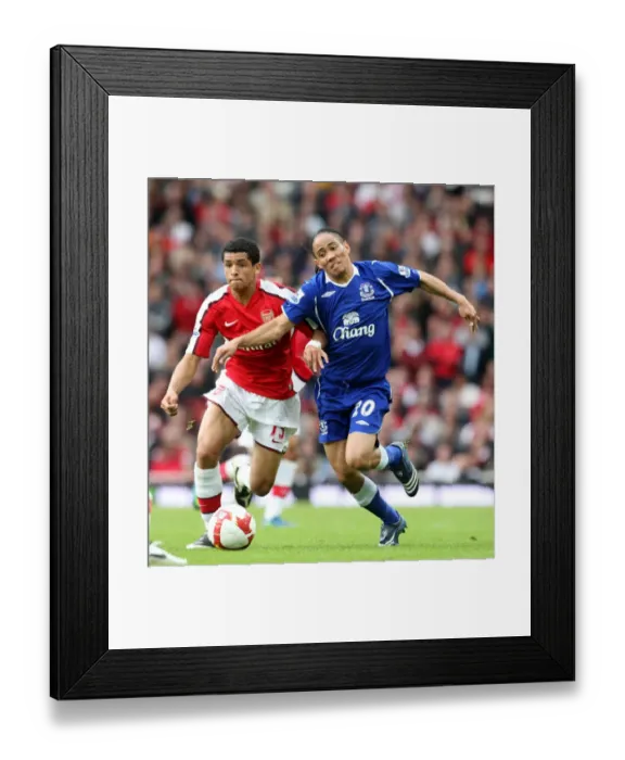 Framed Print : Intense Rivalry: Pienaar vs Denilson at Emirates Stadium - Arsenal vs Everton, Barclays Premier League, October 18, 2008 Framed Print : Intense Rivalry: Pienaar vs Denilson at Emirates Stadium - Arsenal vs Everton, Barclays Premier League, October 18, 2008