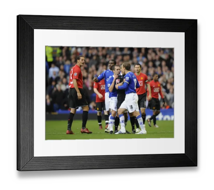 Framed Print : Heated Rivalry: Neville vs Ferdinand Clash - Everton vs Manchester United (08 / 09) Framed Print : Heated Rivalry: Neville vs Ferdinand Clash - Everton vs Manchester United (08 / 09)