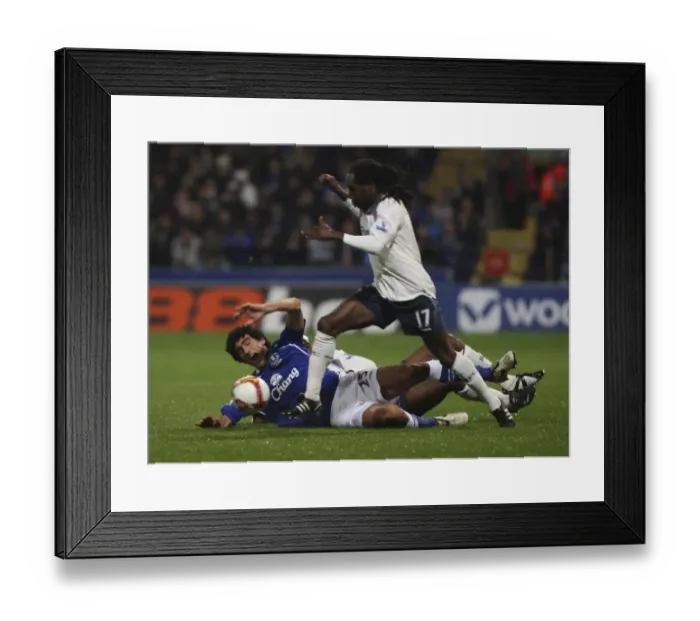 Framed Print : Intense Moment: Fellaini vs. Riga in Bolton vs. Everton Premier League Clash (2008) Framed Print : Intense Moment: Fellaini vs. Riga in Bolton vs. Everton Premier League Clash (2008)
