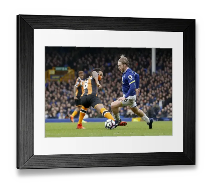 Framed Print : Battle for the Ball: A Head-to-Head Clash between Everton's Tom Davies and Hull City's Tom Huddlestone Framed Print : Battle for the Ball: A Head-to-Head Clash between Everton's Tom Davies and Hull City's Tom Huddlestone