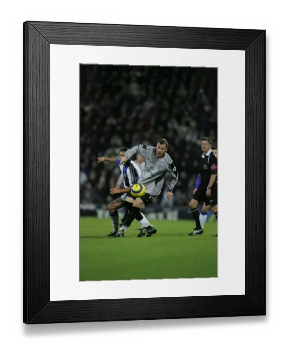 Framed Print : Determined Duncan Ferguson: Defying the Defender Framed Print : Determined Duncan Ferguson: Defying the Defender