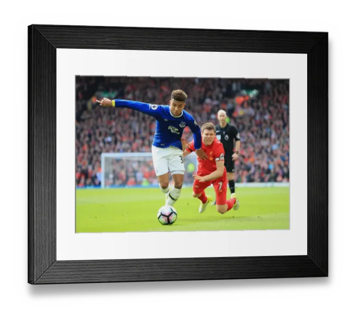 Framed Print : Mason Holgate vs. James Milner: Intense Rivalry at Anfield - Premier League: Liverpool vs. Everton Framed Print : Mason Holgate vs. James Milner: Intense Rivalry at Anfield - Premier League: Liverpool vs. Everton