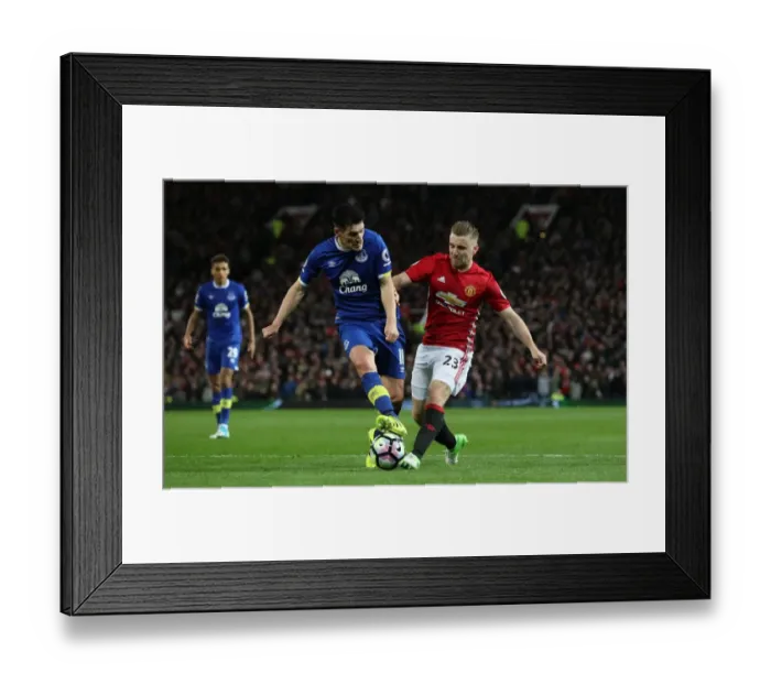 Framed Print : Barry vs Shaw: Intense Battle for Ball Possession - Manchester United vs Everton, Premier League Framed Print : Barry vs Shaw: Intense Battle for Ball Possession - Manchester United vs Everton, Premier League