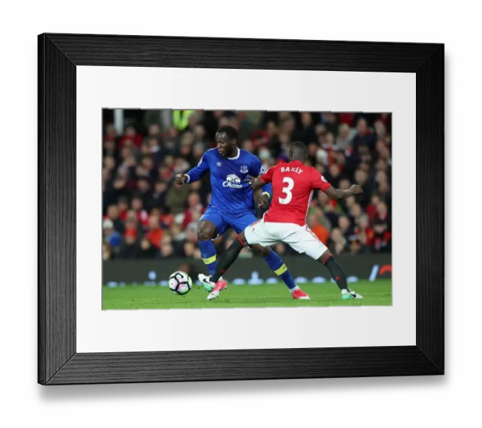 Framed Print : EPL Showdown: Lukaku vs. Bailly - A Battle for Supremacy at Old Trafford (Manchester United vs. Everton) Framed Print : EPL Showdown: Lukaku vs. Bailly - A Battle for Supremacy at Old Trafford (Manchester United vs. Everton)