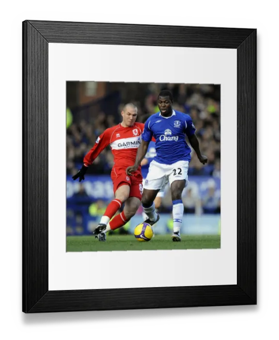 Framed Print : Everton vs Middlesbrough: A Battle in the Premier League - Digard and Yakubu's Clash at Goodison Park (November 16, 2008)