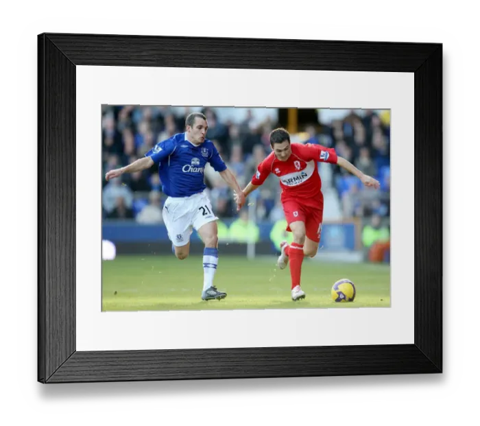 Framed Print : Osman vs Downing: Everton vs Middlesbrough in Premier League Action, November 2008 Framed Print : Osman vs Downing: Everton vs Middlesbrough in Premier League Action, November 2008