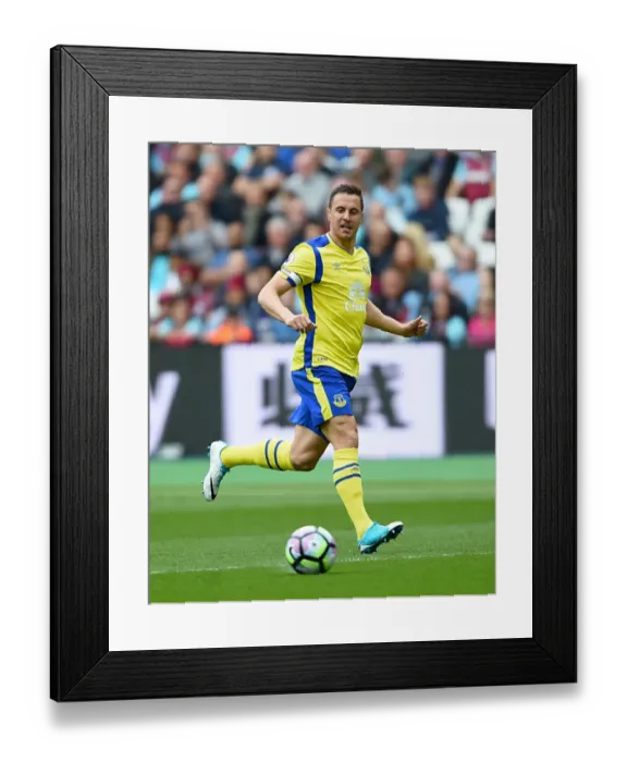 Framed Print : Everton's Phil Jagielka in Action against West Ham United at London Stadium - Premier League 2016-17 Framed Print : Everton's Phil Jagielka in Action against West Ham United at London Stadium - Premier League 2016-17