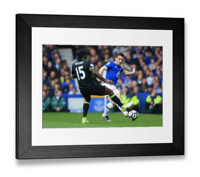 Framed Print : Battle for Supremacy: Victor Moses vs. Leighton Baines at Goodison Park - Everton vs. Chelsea (Premier League, 2016-17) Framed Print : Battle for Supremacy: Victor Moses vs. Leighton Baines at Goodison Park - Everton vs. Chelsea (Premier League, 2016-17)