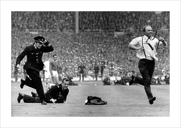 The Great Pitch Invasion: A Fan's Escape at the 1966 FA Cup Final - Everton vs. Sheffield Wednesday