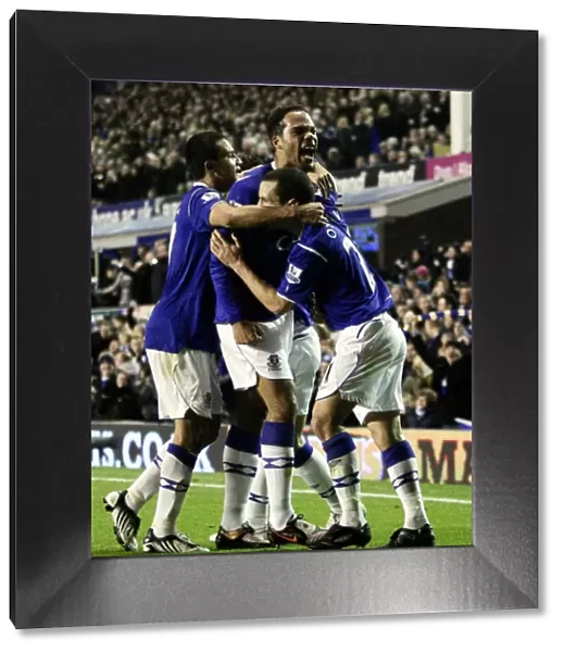 Everton's Joleon Lescott Scores First Goal, Celebrates with Tim Cahill and Leon Osman (08 / 09)