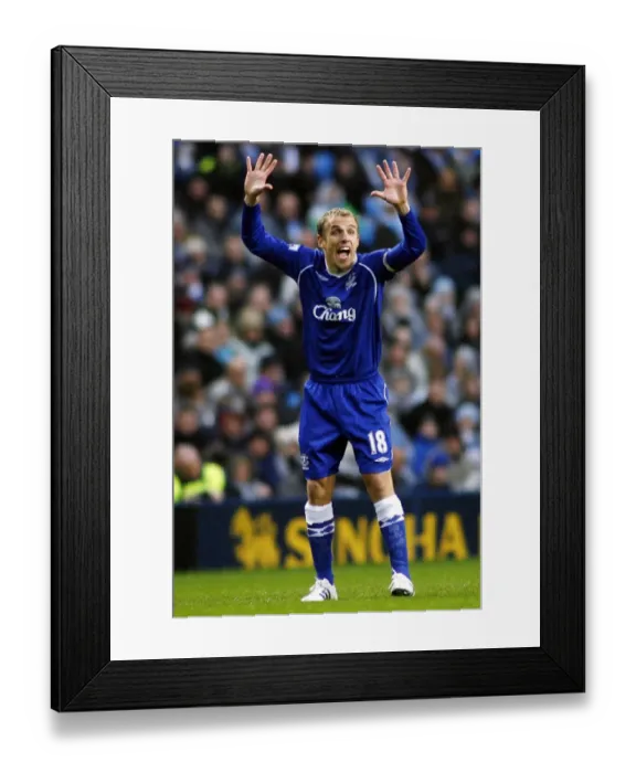 Framed Print : Phil Neville Gives Instructions: Everton vs Manchester City (08 / 09)