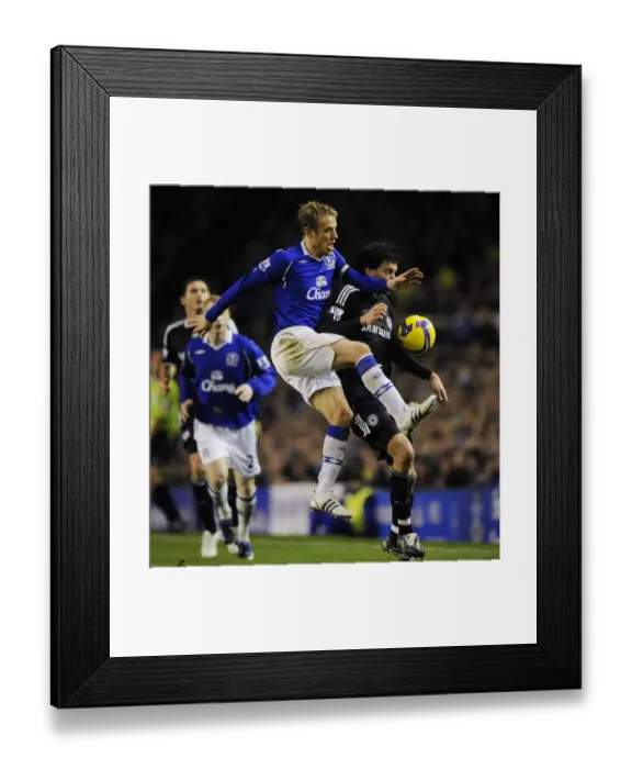 Framed Print : Neville vs Ballack: A Premier League Battle at Goodison Park - Everton vs Chelsea, December 2008 Framed Print : Neville vs Ballack: A Premier League Battle at Goodison Park - Everton vs Chelsea, December 2008